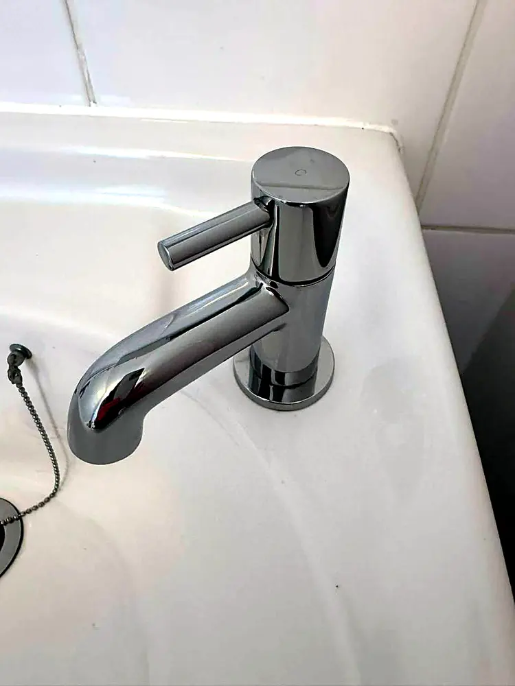 The same tap polished to a spotless mirror shine